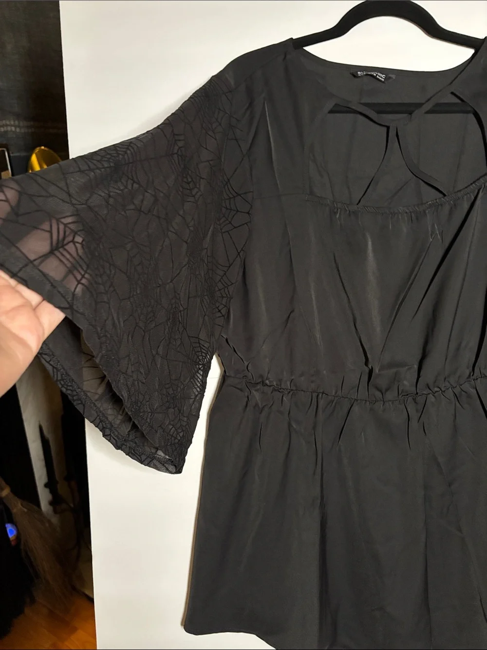 BloomChic Black Peplum Tunic with Lace Sleeves